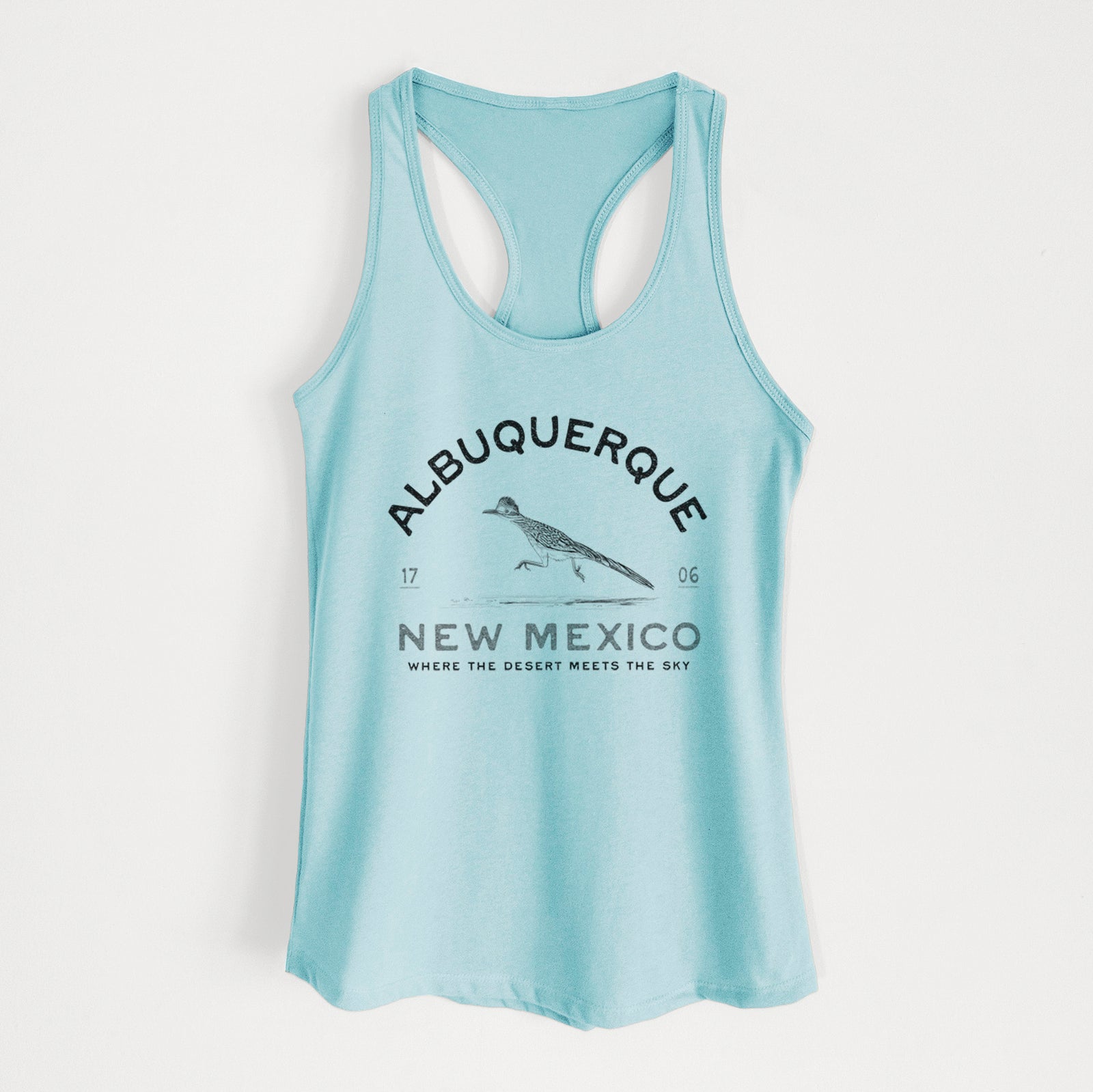 Banana cream women's racerback tank top laid flat, printed with a black ink roadrunner with the words Albuquerque New Mexico, 1706, Where the Desert Meets the Sky.
