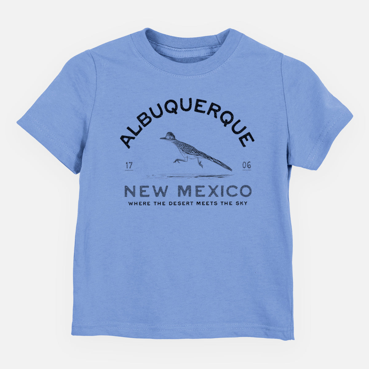 Carolina blue toddler t-shirt laid flat, printed with a black ink roadrunner with the words Albuquerque New Mexico, 1706, Where the Desert Meets the Sky.
