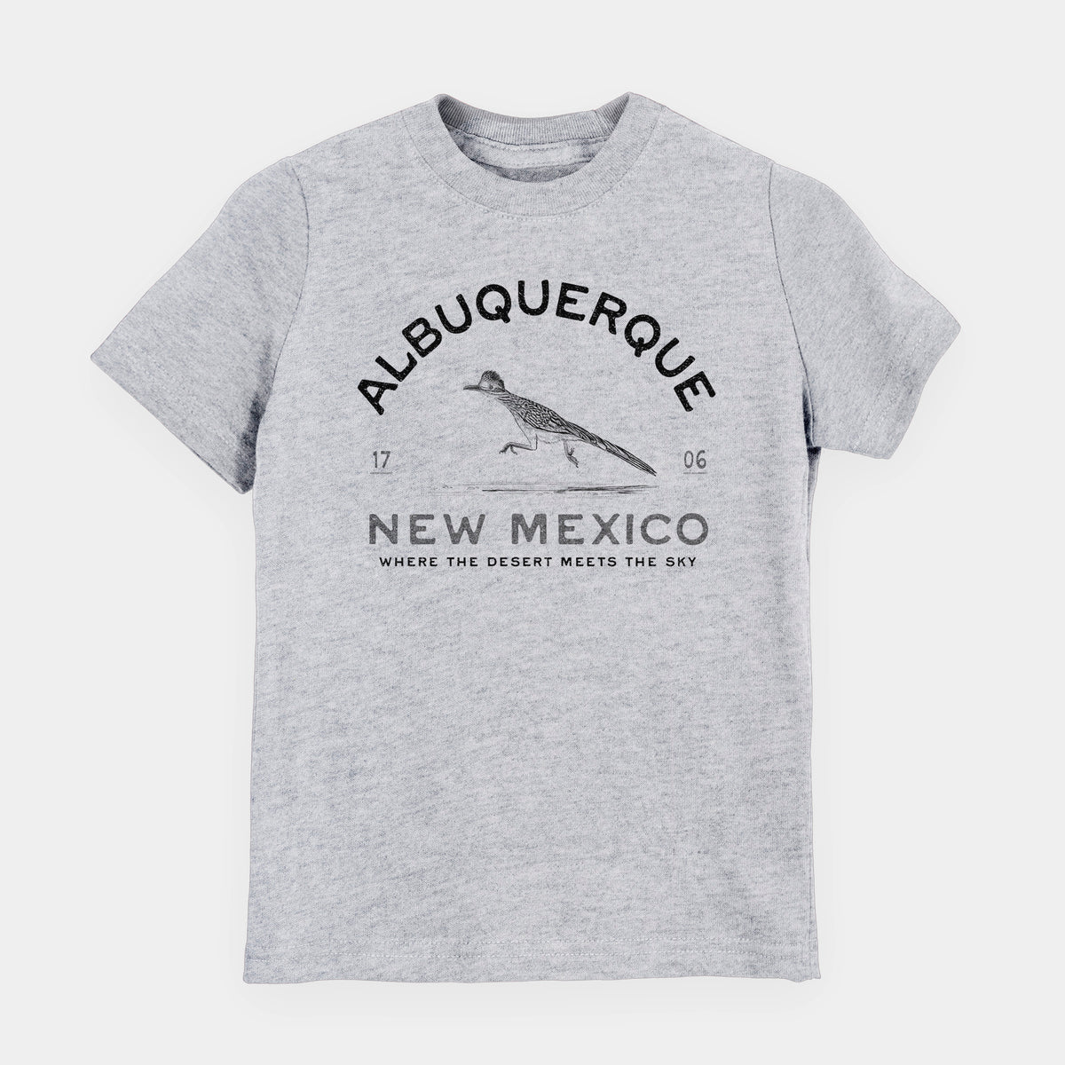 Heather grey youth t-shirt laid flat, printed with a black ink roadrunner with the words Albuquerque New Mexico, 1706, Where the Desert Meets the Sky.