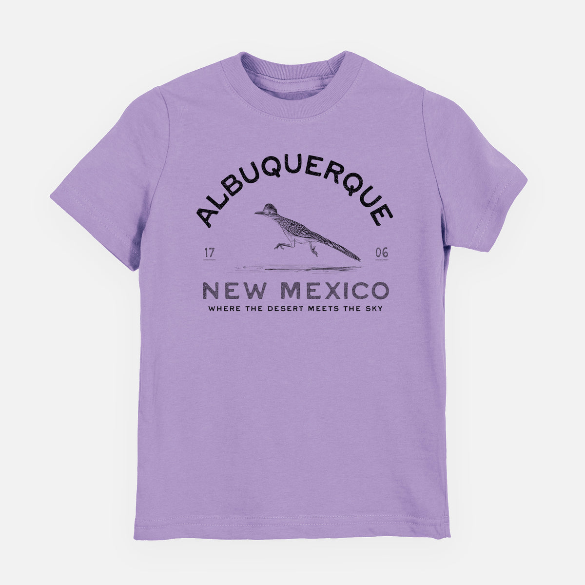 Lavender youth t-shirt laid flat, printed with a black ink roadrunner with the words Albuquerque New Mexico, 1706, Where the Desert Meets the Sky.