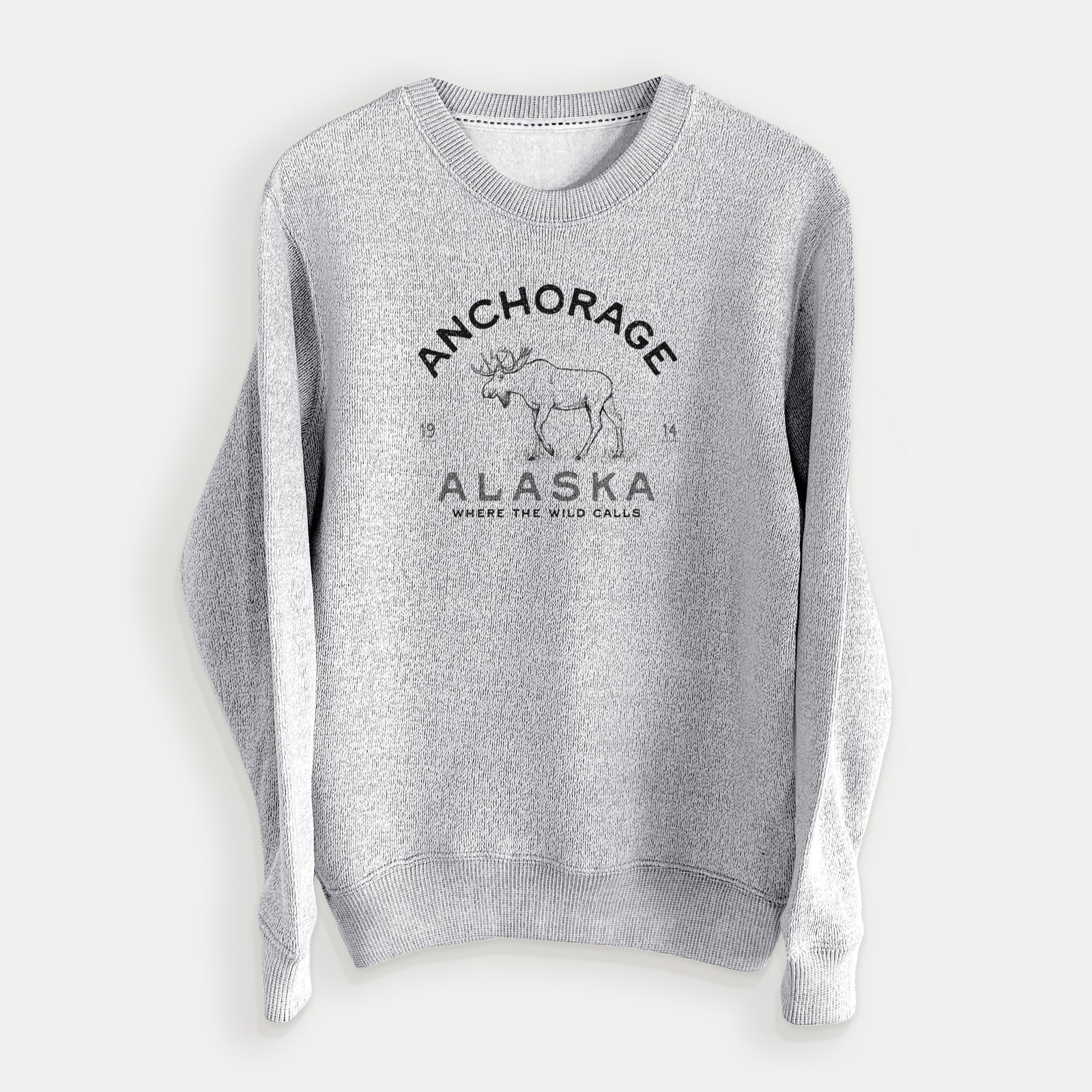 Salt and pepper knit sweatshirt laid flat, printed with a black ink moose with the words Anchorage Alaska, 1914, Where the Wild Calls.