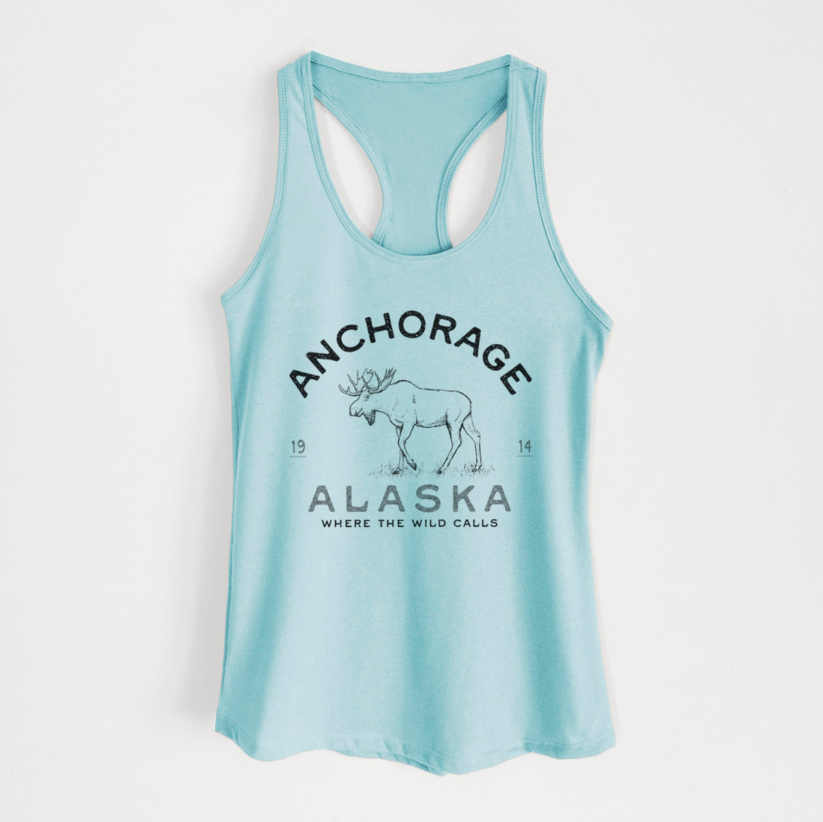 Cancun blue women's racerback tank top laid flat, printed with a black ink moose with the words Anchorage Alaska, 1914, Where the Wild Calls.