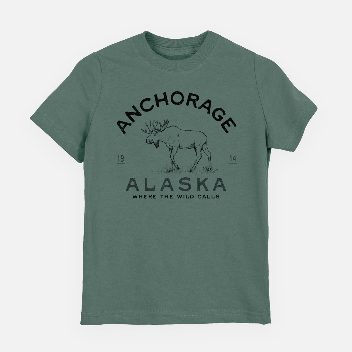 Basil green youth t-shirt laid flat, printed with a black ink moose with the words Anchorage Alaska, 1914, Where the Wild Calls.