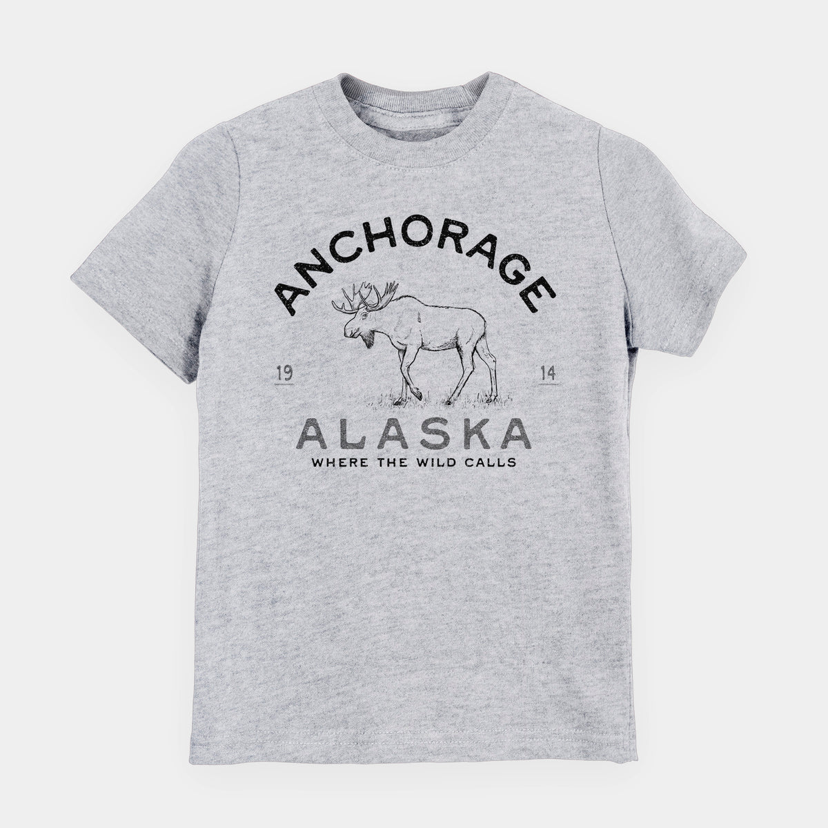 Heather grey youth t-shirt laid flat, printed with a black ink moose with the words Anchorage Alaska, 1914, Where the Wild Calls.
