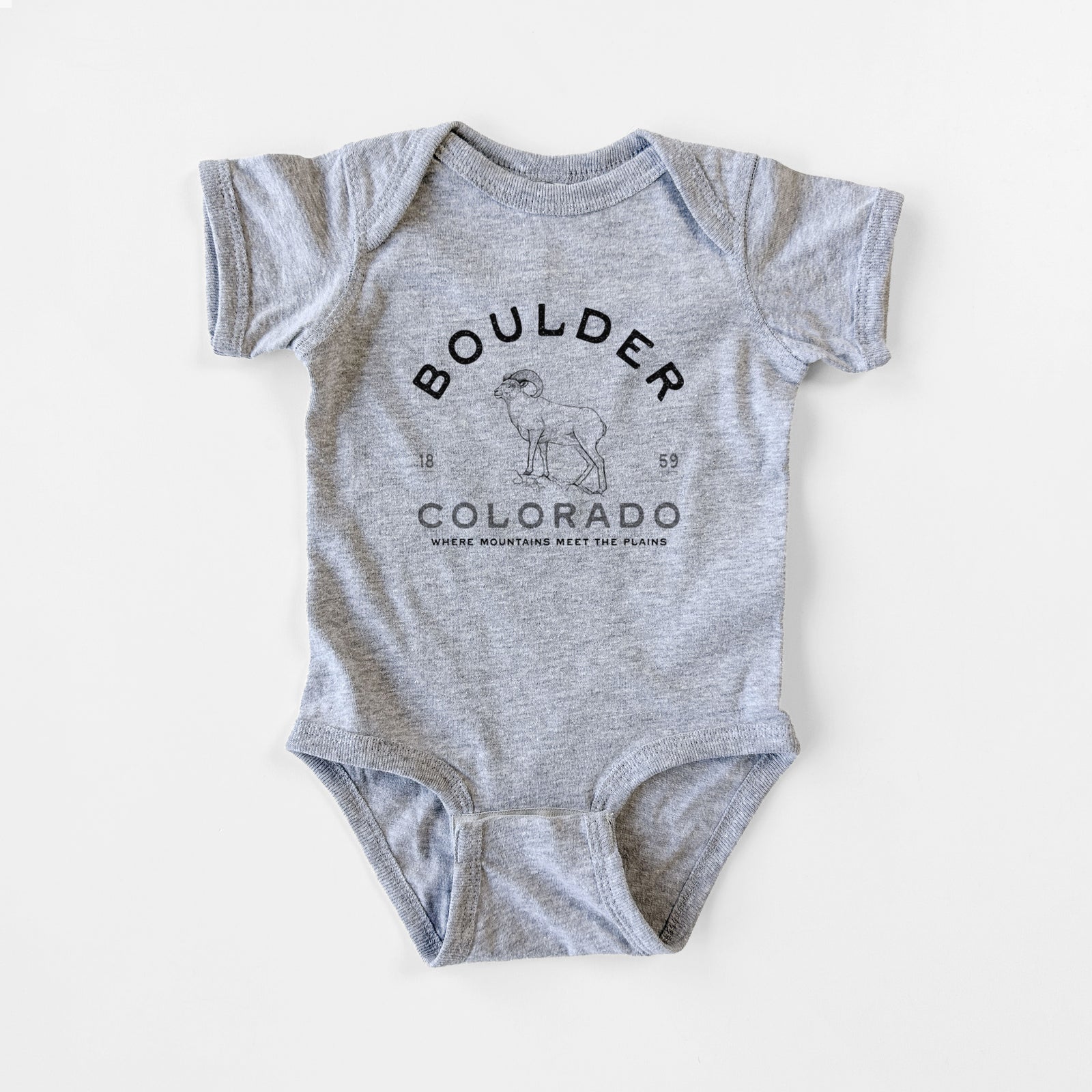 Grey baby bodysuit laid flat, printed with a black ink bighorn sheep with the words Boulder Colorado, Where Mountains Meet the Plains, 1859.