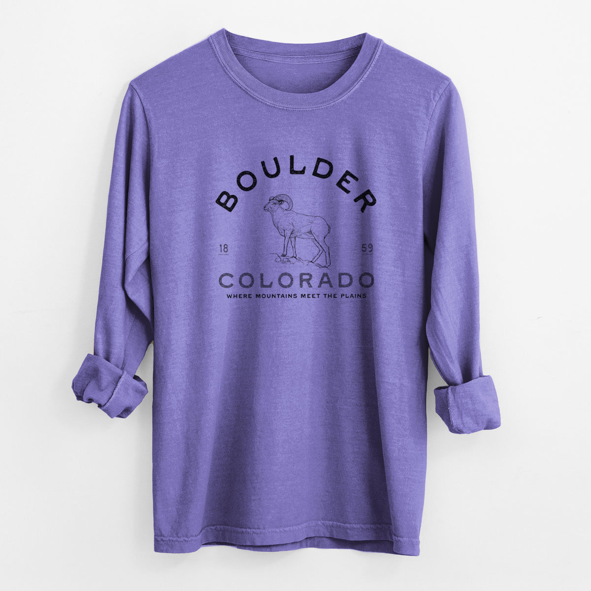 Violet purple Comfort Colors long sleeve shirt laid flat with the cuffs rolled, printed with a black ink bighorn sheep with the words Boulder Colorado, Where Mountains Meet the Plains, 1859.