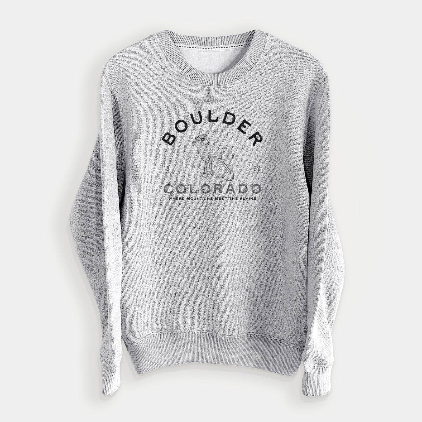 Salt and pepper knit sweatshirt laid flat, printed with a black ink bighorn sheep with the words Boulder Colorado, Where Mountains Meet the Plains, 1859.