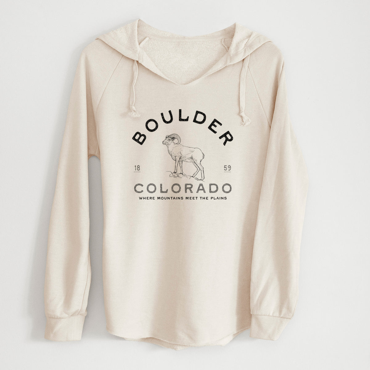 Bone cream women's Cali Wave hooded sweatshirt laid flat, printed with a black ink bighorn sheep with the words Boulder Colorado, Where Mountains Meet the Plains, 1859.