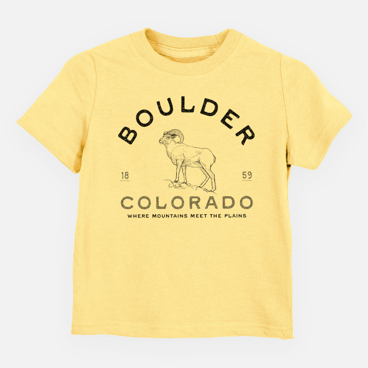 Butter yellow toddler t-shirt laid flat, printed with a black ink bighorn sheep with the words Boulder Colorado, Where Mountains Meet the Plains, 1859.