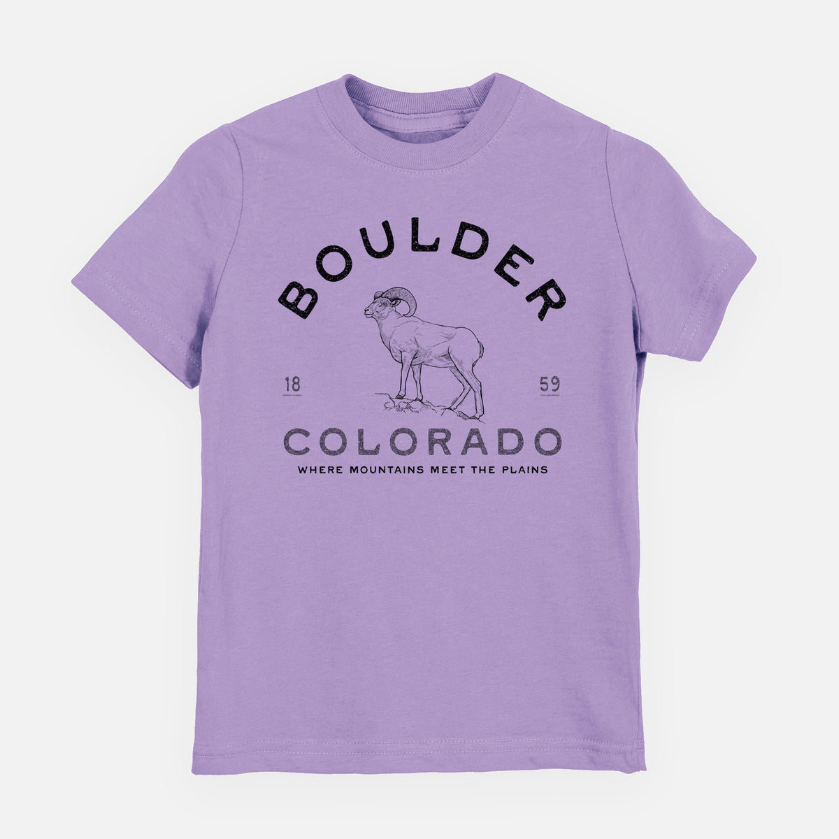 Lavender youth t-shirt laid flat, printed with a black ink bighorn sheep with the words Boulder Colorado, Where Mountains Meet the Plains, 1859.