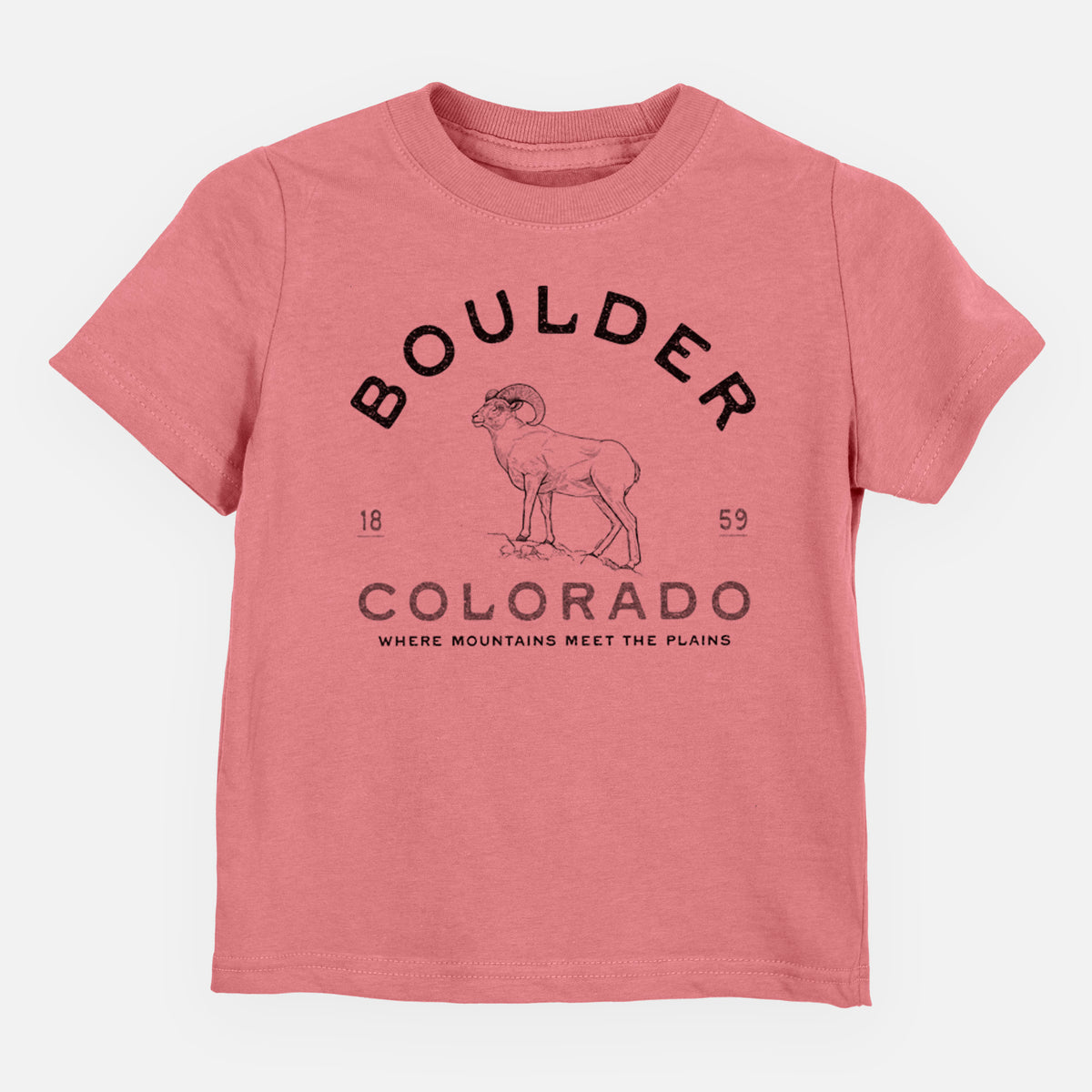 Mauve pink toddler t-shirt laid flat, printed with a black ink bighorn sheep with the words Boulder Colorado, Where Mountains Meet the Plains, 1859.
