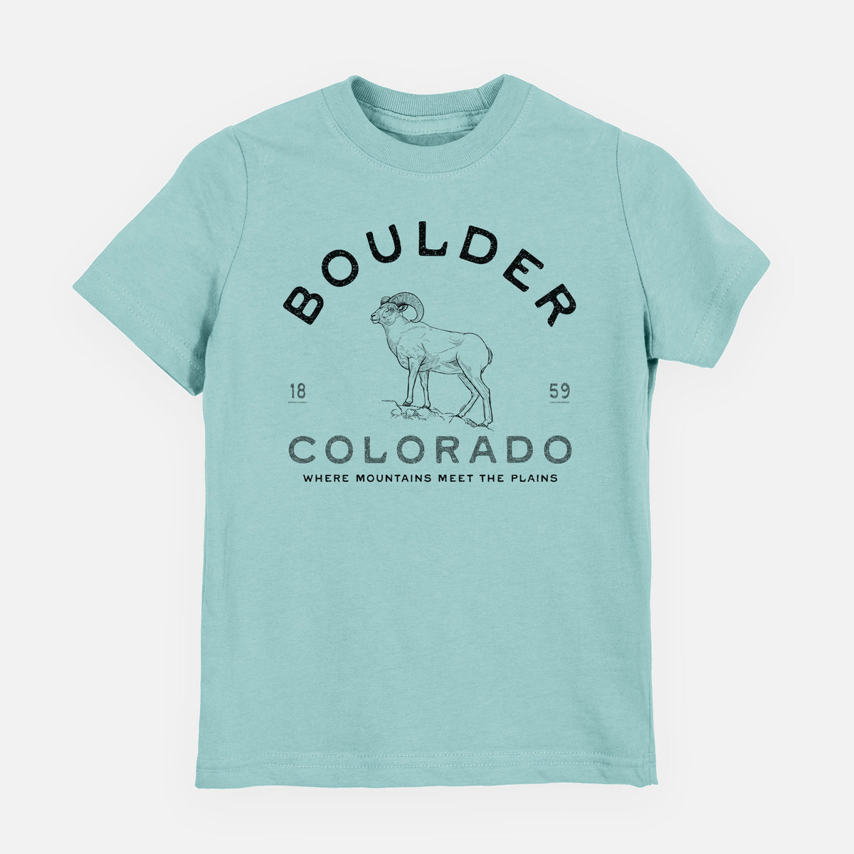 Saltwater youth t-shirt laid flat, printed with a black ink bighorn sheep with the words Boulder Colorado, Where Mountains Meet the Plains, 1859.