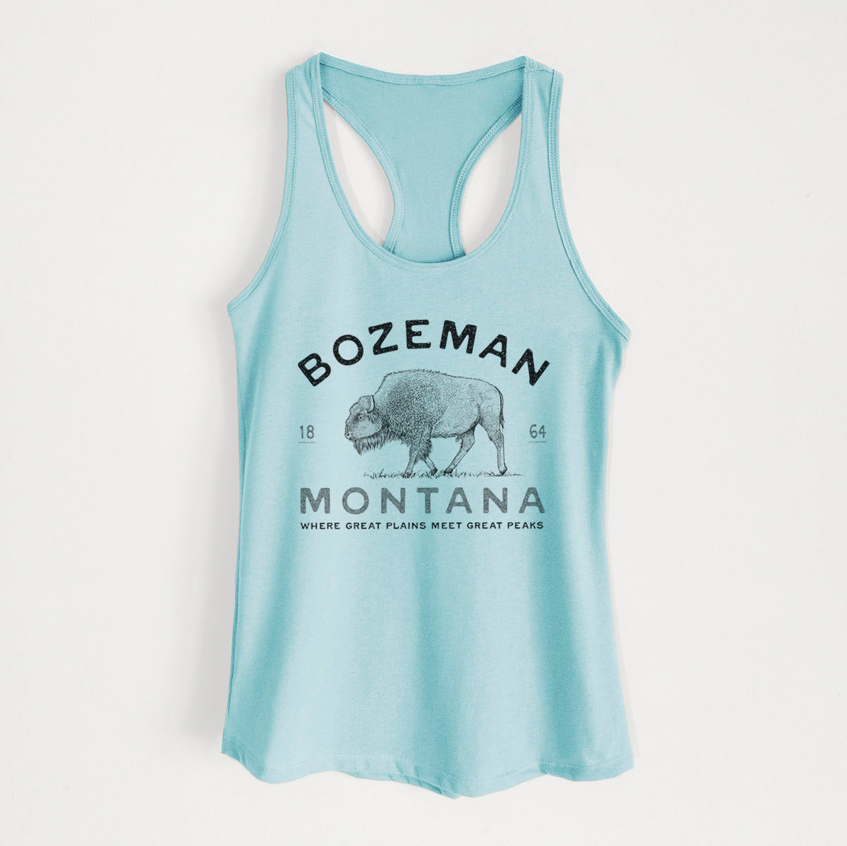 Cancun blue women's racerback tank top laid flat, printed with a black ink bison with the words Bozeman Montana, 1864, Where Great Plains Meet Great Peaks.