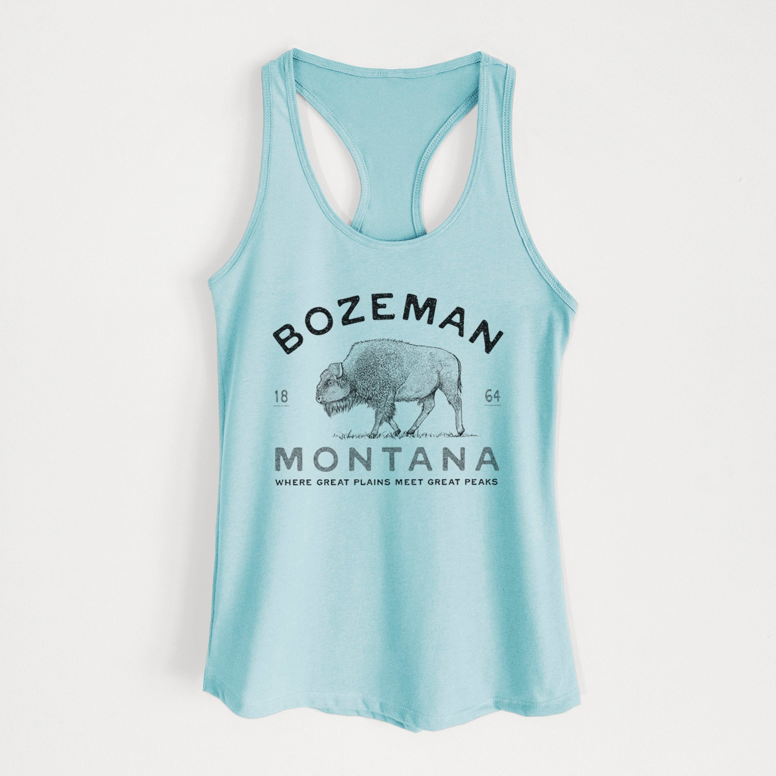 Banana cream women's racerback tank top laid flat, printed with a black ink bison with the words Bozeman Montana, 1864, Where Great Plains Meet Great Peaks.