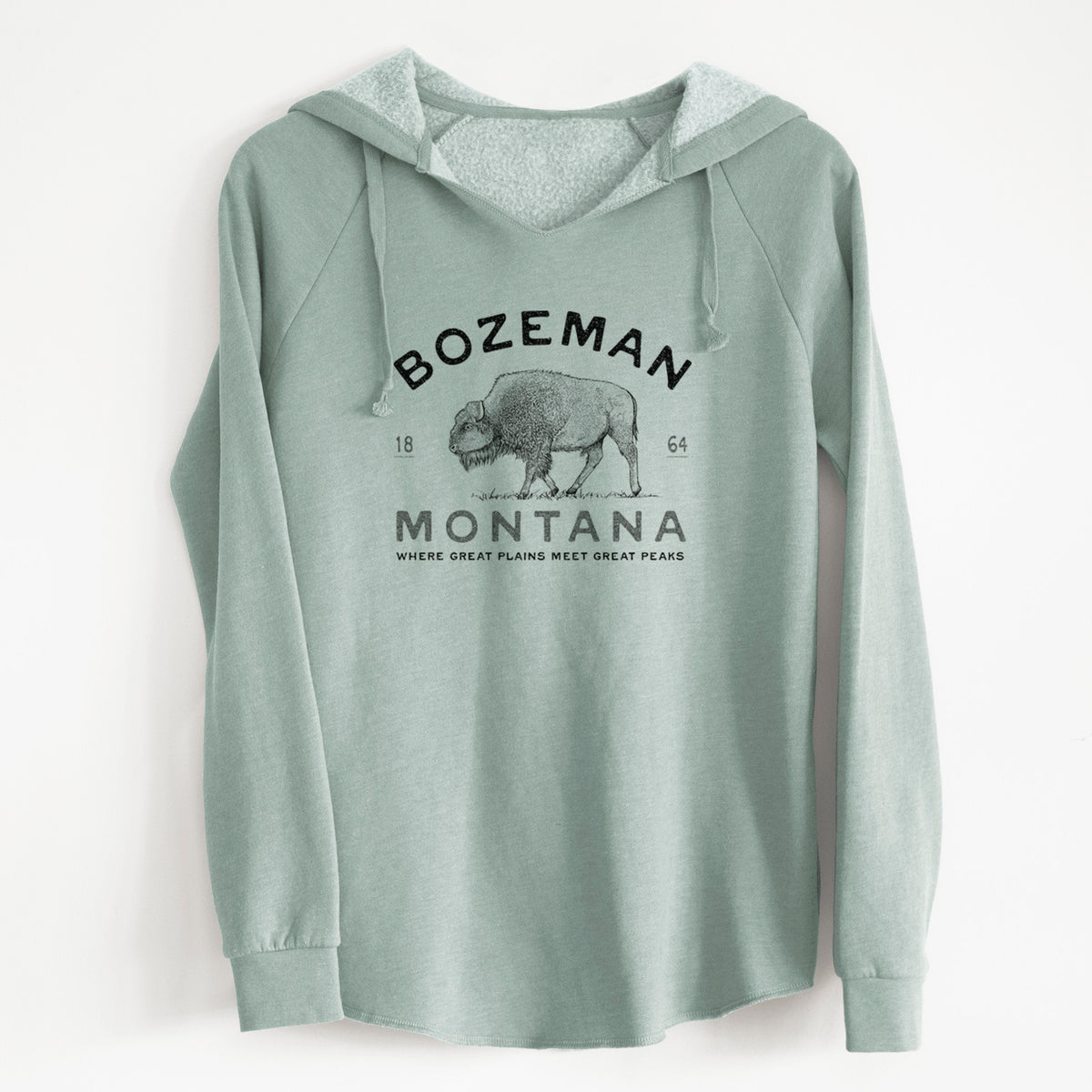 Sage green women's Cali Wave hooded sweatshirt laid flat, printed with a black ink bison with the words Bozeman Montana, 1864, Where Great Plains Meet Great Peaks.