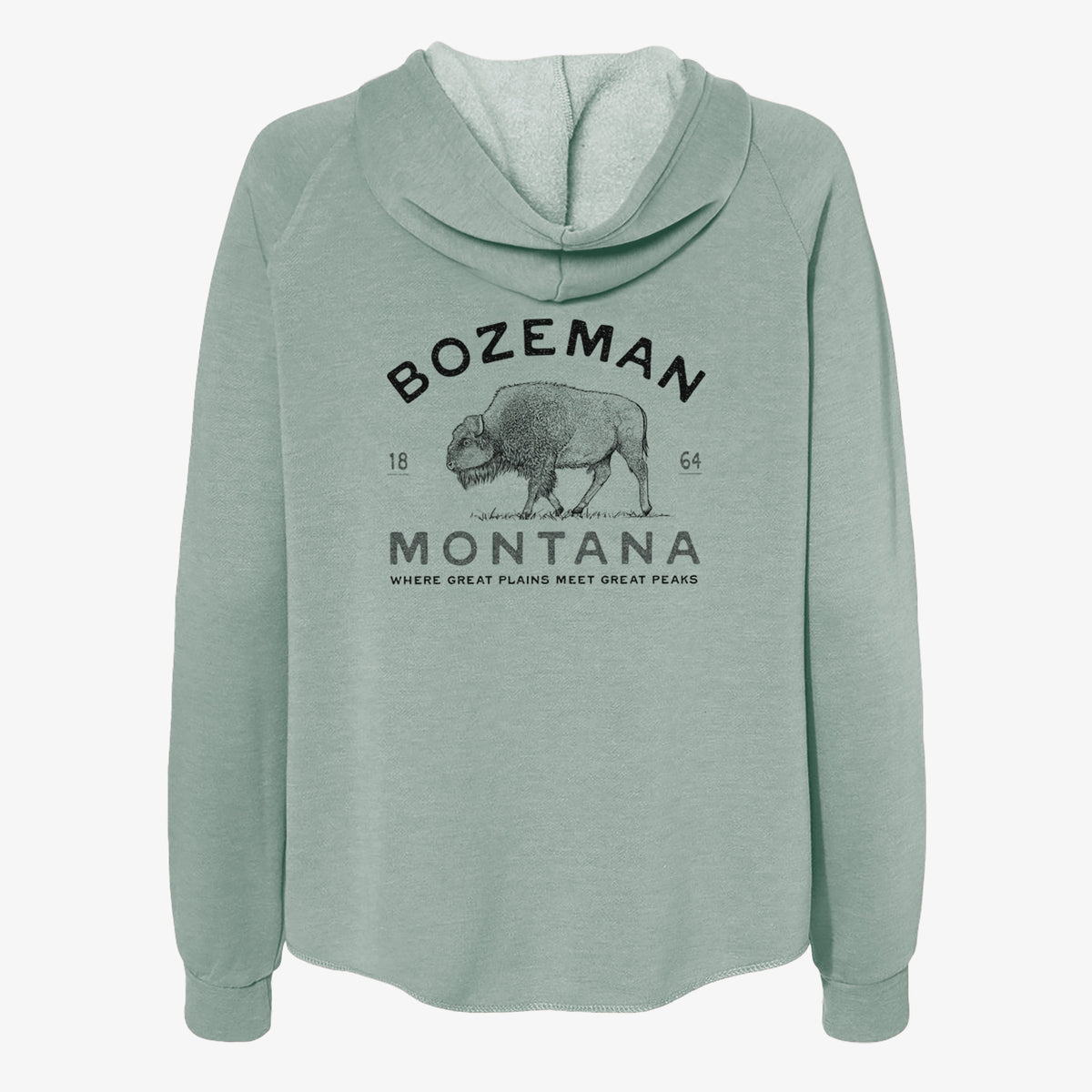 Sage green women's Cali Wave zip-up sweatshirt laid flat, printed with a black ink bison with the words Bozeman Montana, 1864, Where Great Plains Meet Great Peaks.