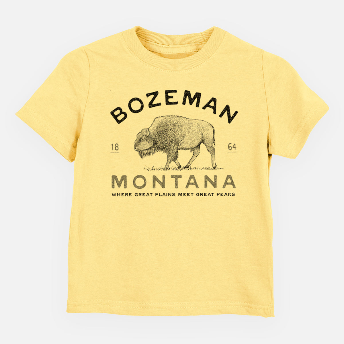 Butter yellow toddler t-shirt laid flat, printed with a black ink bison with the words Bozeman Montana, 1864, Where Great Plains Meet Great Peaks.