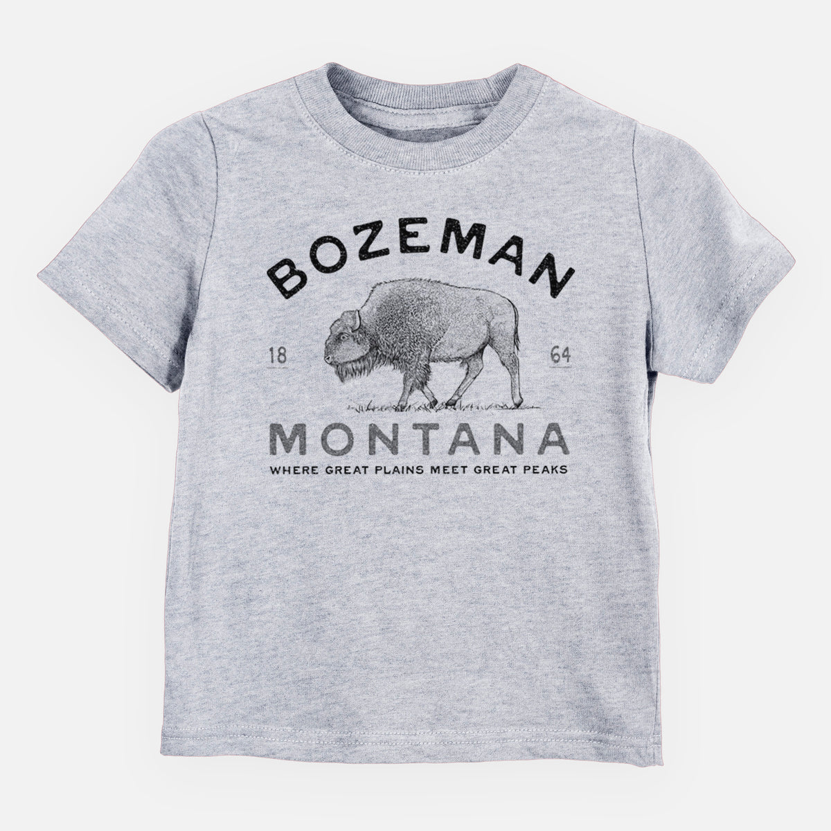 Heather grey toddler t-shirt laid flat, printed with a black ink bison with the words Bozeman Montana, 1864, Where Great Plains Meet Great Peaks.