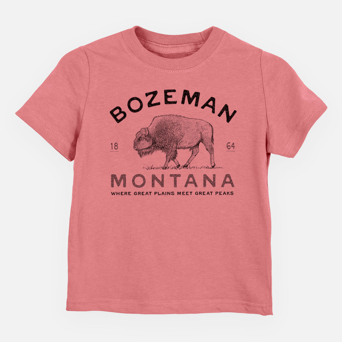 Mauve pink toddler t-shirt laid flat, printed with a black ink bison with the words Bozeman Montana, 1864, Where Great Plains Meet Great Peaks.