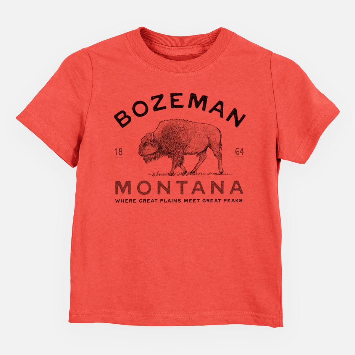 Passionfruit pink toddler t-shirt laid flat, printed with a black ink bison with the words Bozeman Montana, 1864, Where Great Plains Meet Great Peaks.