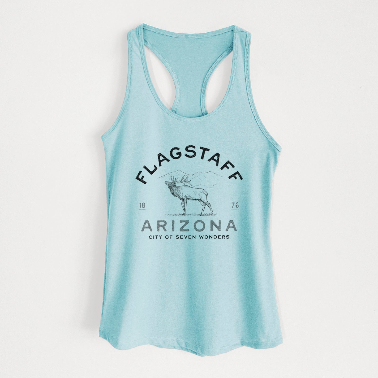Banana cream women's racerback tank top laid flat, printed with a black ink elk with the words Flagstaff Arizona, City of Seven Wonders.