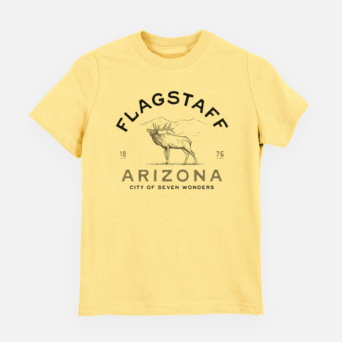 Butter yellow youth t-shirt laid flat, printed with a black ink elk with the words Flagstaff Arizona, City of Seven Wonders.