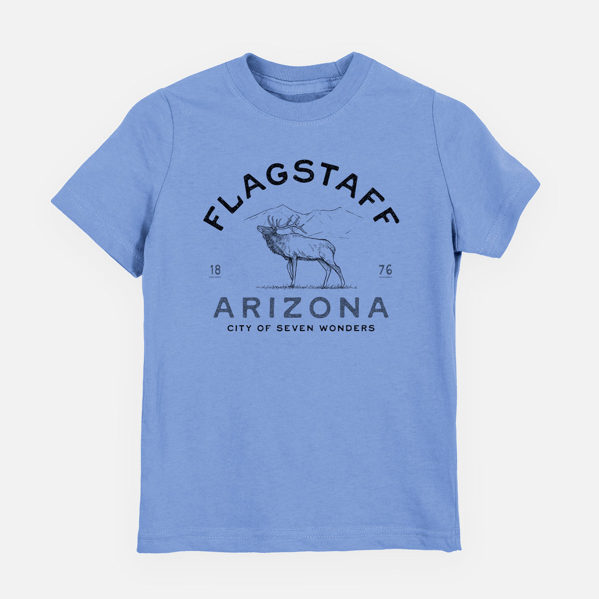 Carolina blue youth t-shirt laid flat, printed with a black ink elk with the words Flagstaff Arizona, City of Seven Wonders.