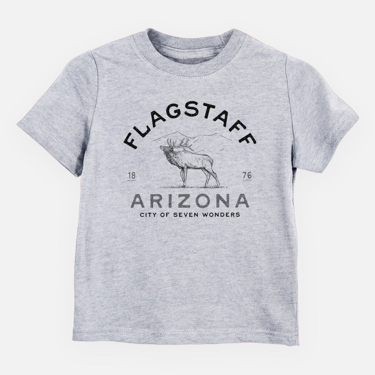 Heather grey toddler t-shirt laid flat, printed with a black ink elk with the words Flagstaff Arizona, City of Seven Wonders.