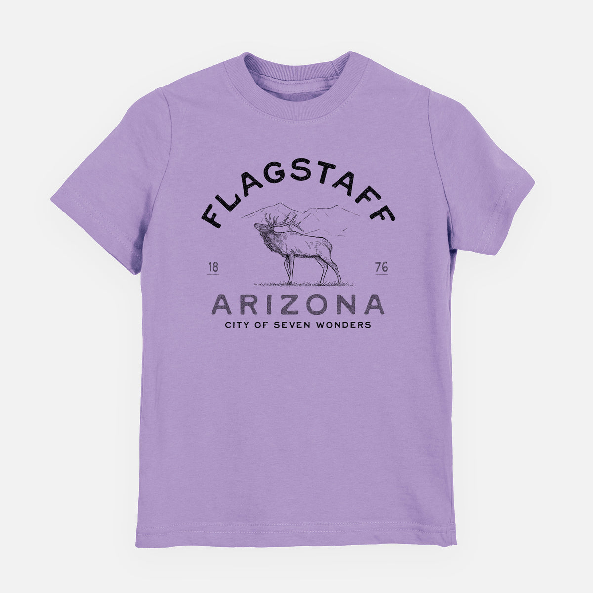 Lavender youth t-shirt laid flat, printed with a black ink elk with the words Flagstaff Arizona, City of Seven Wonders.