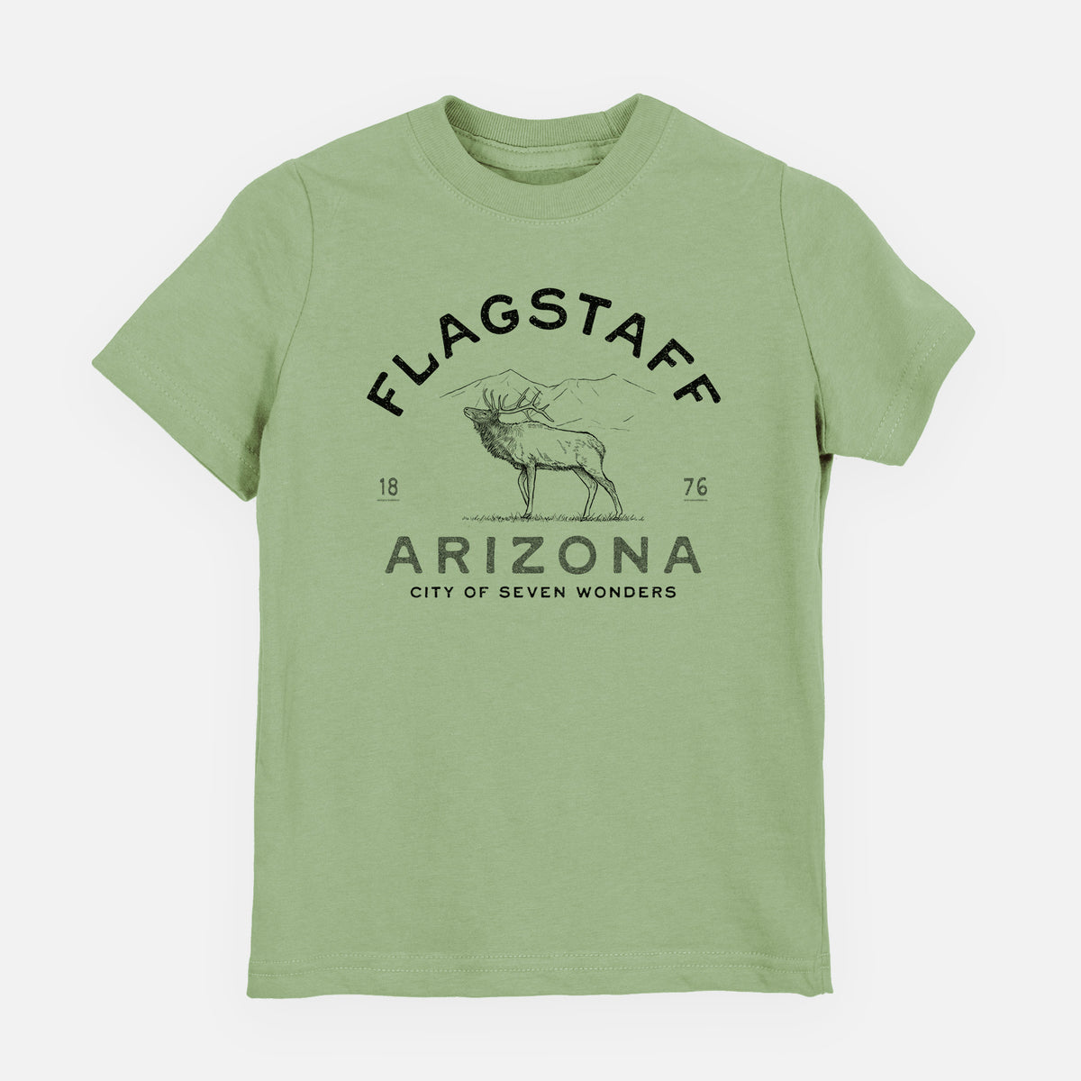 Sage green youth t-shirt laid flat, printed with a black ink elk with the words Flagstaff Arizona, City of Seven Wonders.