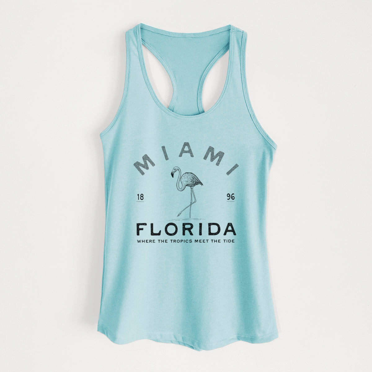 Cancun blue women's racerback tank top laid flat, printed with a black ink flamingo with the words Miami Florida, 1896, Where the Tropics Meet the Tide.
