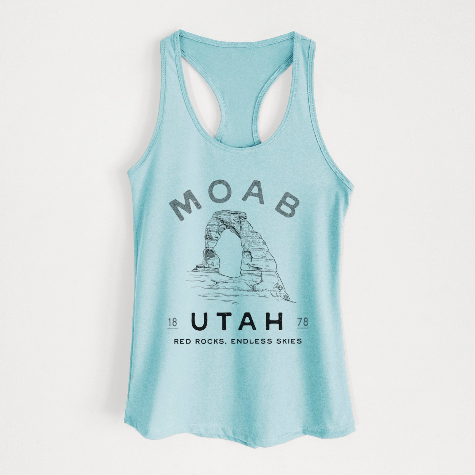 Banana cream women's racerback tank top laid flat, printed with a black ink illustration of Delicate Arch with the words Moab Utah, 1878.