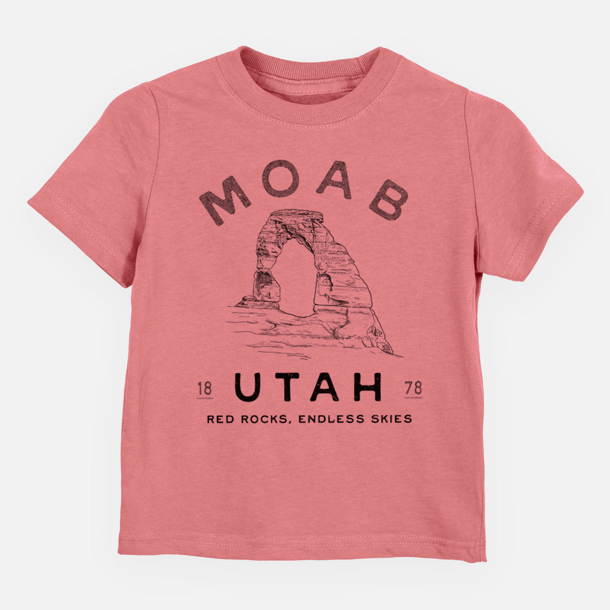 Mauve pink toddler t-shirt laid flat, printed with a black ink illustration of Delicate Arch with the words Moab Utah, 1878.