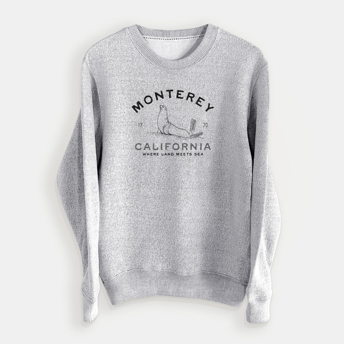 Salt and pepper knit sweatshirt laid flat, printed with a black ink sea lion with the words Monterey California, 1770, Where Land Meets Sea.