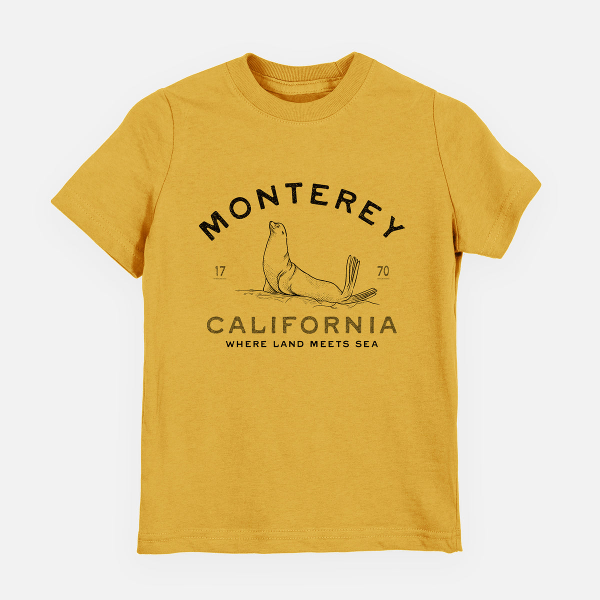 Honeycomb yellow youth t-shirt laid flat, printed with a black ink sea lion with the words Monterey California, 1770, Where Land Meets Sea.