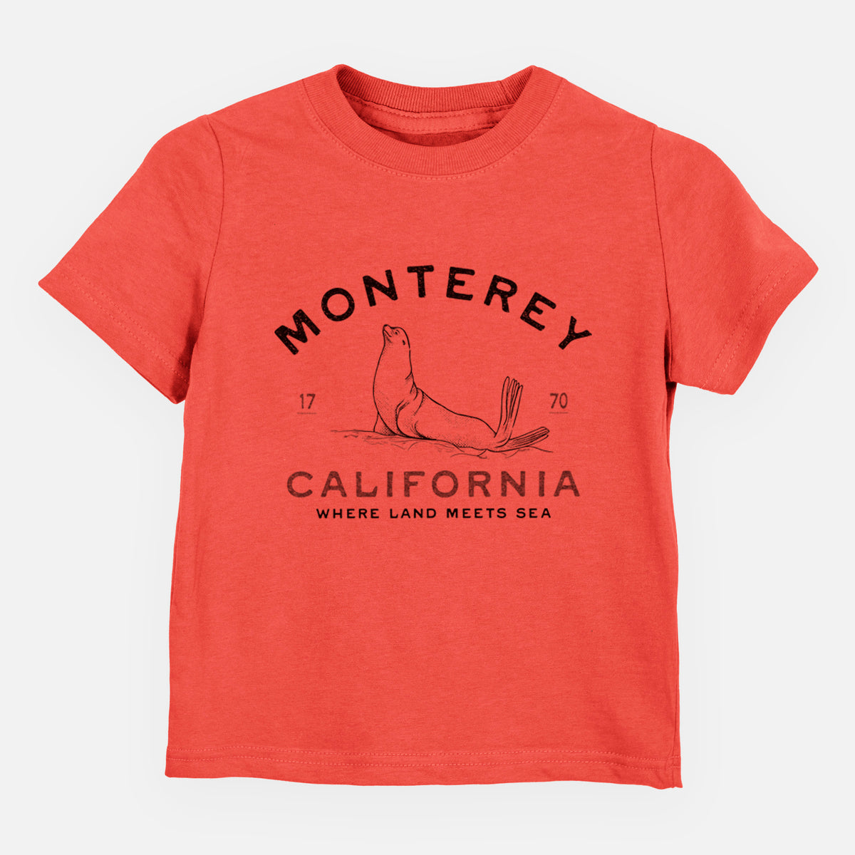 Passionfruit pink toddler t-shirt laid flat, printed with a black ink sea lion with the words Monterey California, 1770, Where Land Meets Sea.