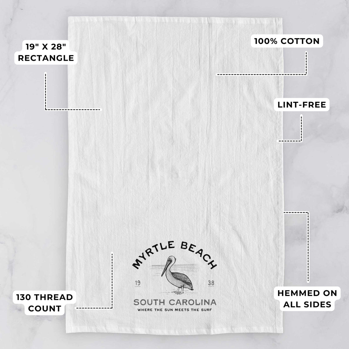 White tea towel printed with a black ink pelican on a post with the words Myrtle Beach South Carolina, Where the Sun Meets the Surf, with feature labels: 19 by 28 inch rectangle, 100% cotton, lint-free, 130 thread count, hemmed on all sides.