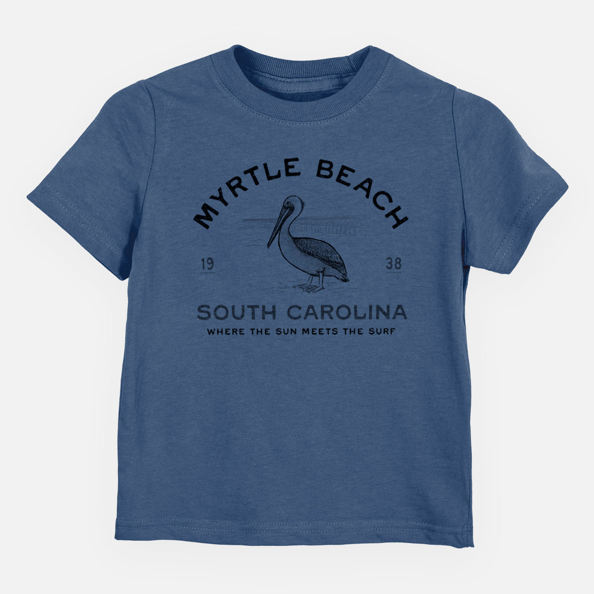 Indigo blue toddler t-shirt laid flat, printed with a black ink pelican on a post with the words Myrtle Beach South Carolina, Where the Sun Meets the Surf.