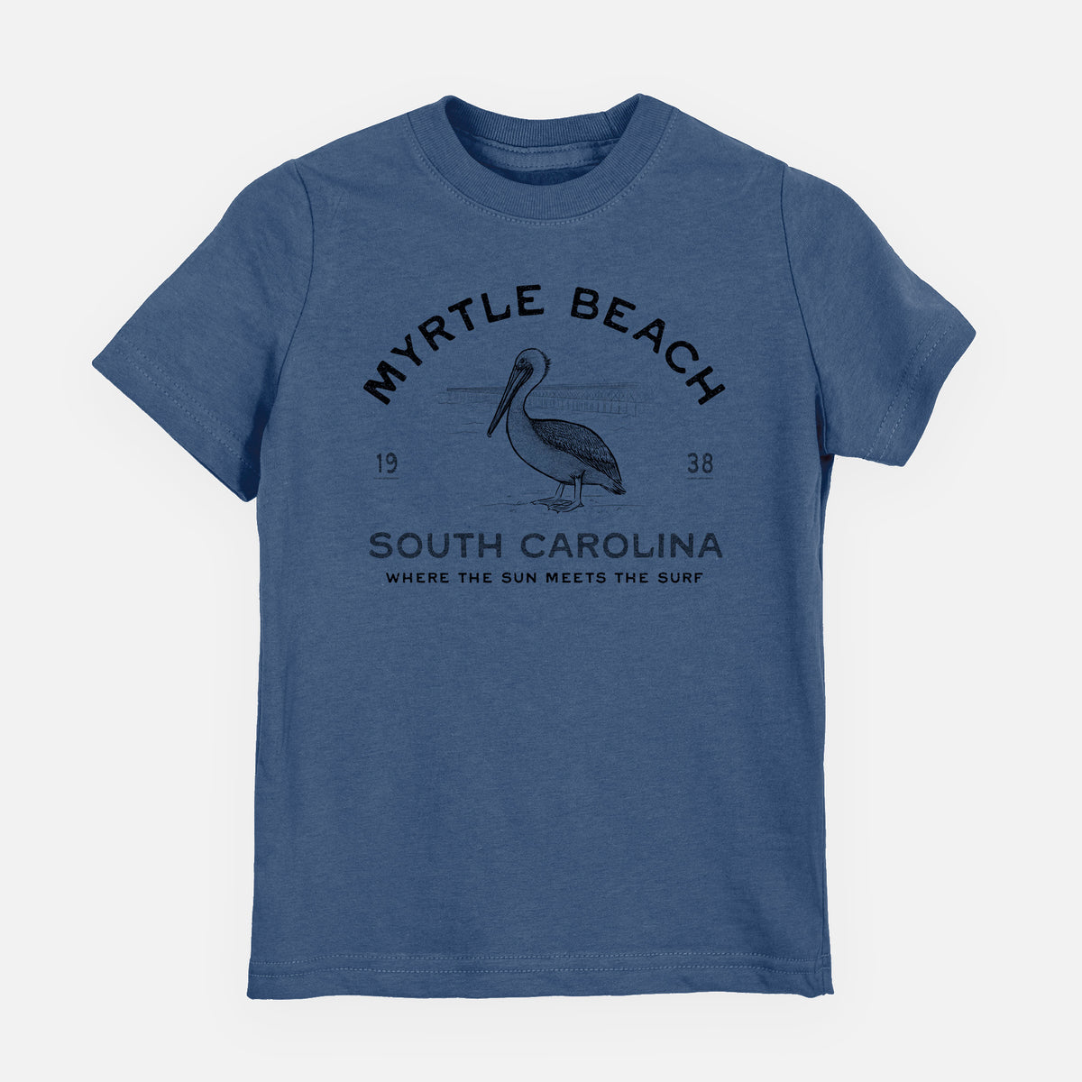 Indigo blue youth t-shirt laid flat, printed with a black ink pelican on a post with the words Myrtle Beach South Carolina, Where the Sun Meets the Surf.