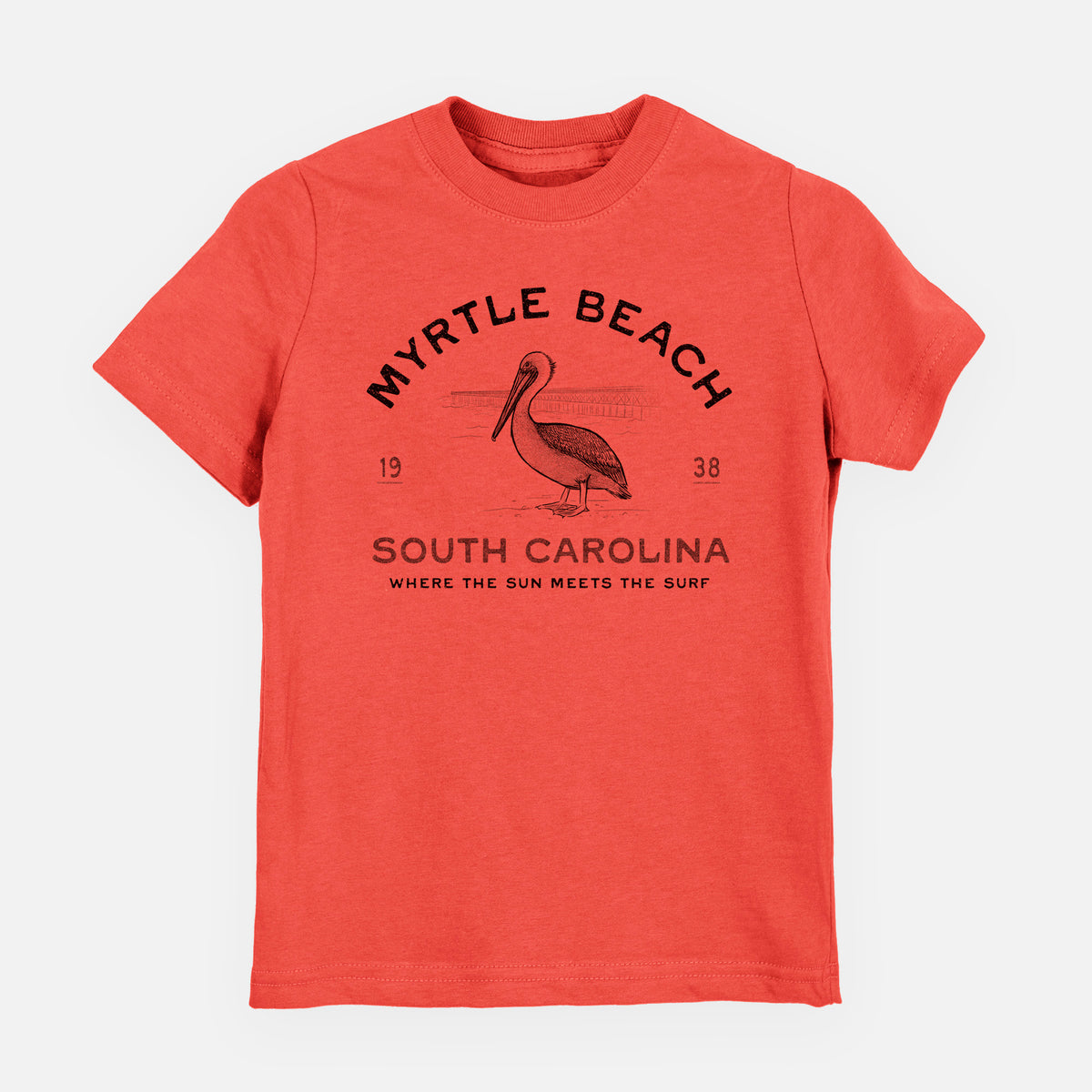 Passionfruit pink youth t-shirt laid flat, printed with a black ink pelican on a post with the words Myrtle Beach South Carolina, Where the Sun Meets the Surf.