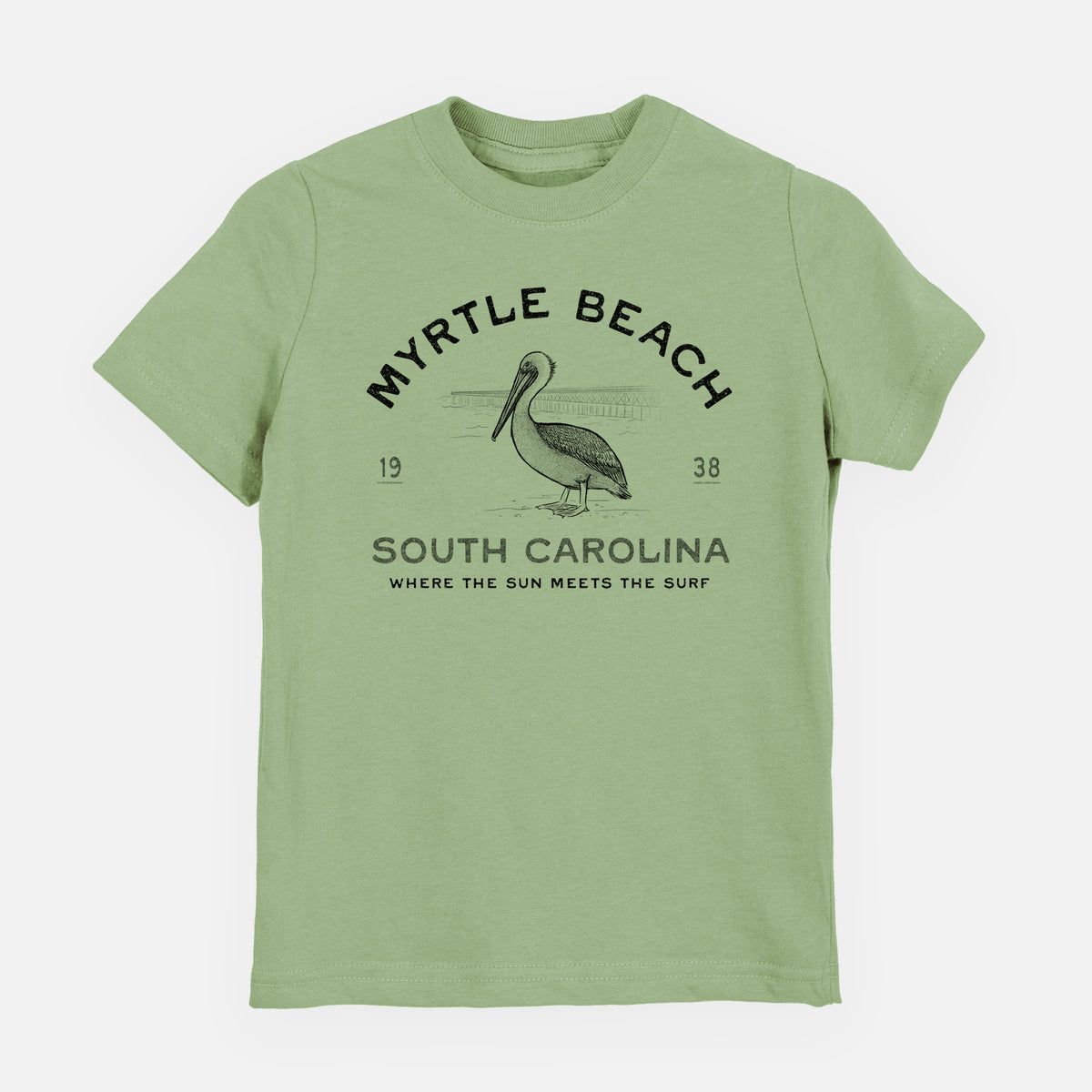 Sage green youth t-shirt laid flat, printed with a black ink pelican on a post with the words Myrtle Beach South Carolina, Where the Sun Meets the Surf.