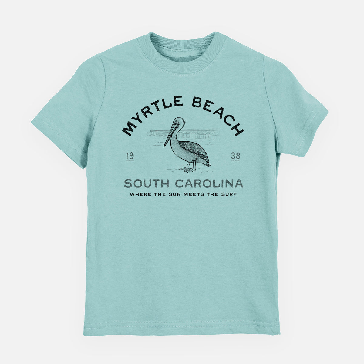 Saltwater youth t-shirt laid flat, printed with a black ink pelican on a post with the words Myrtle Beach South Carolina, Where the Sun Meets the Surf.