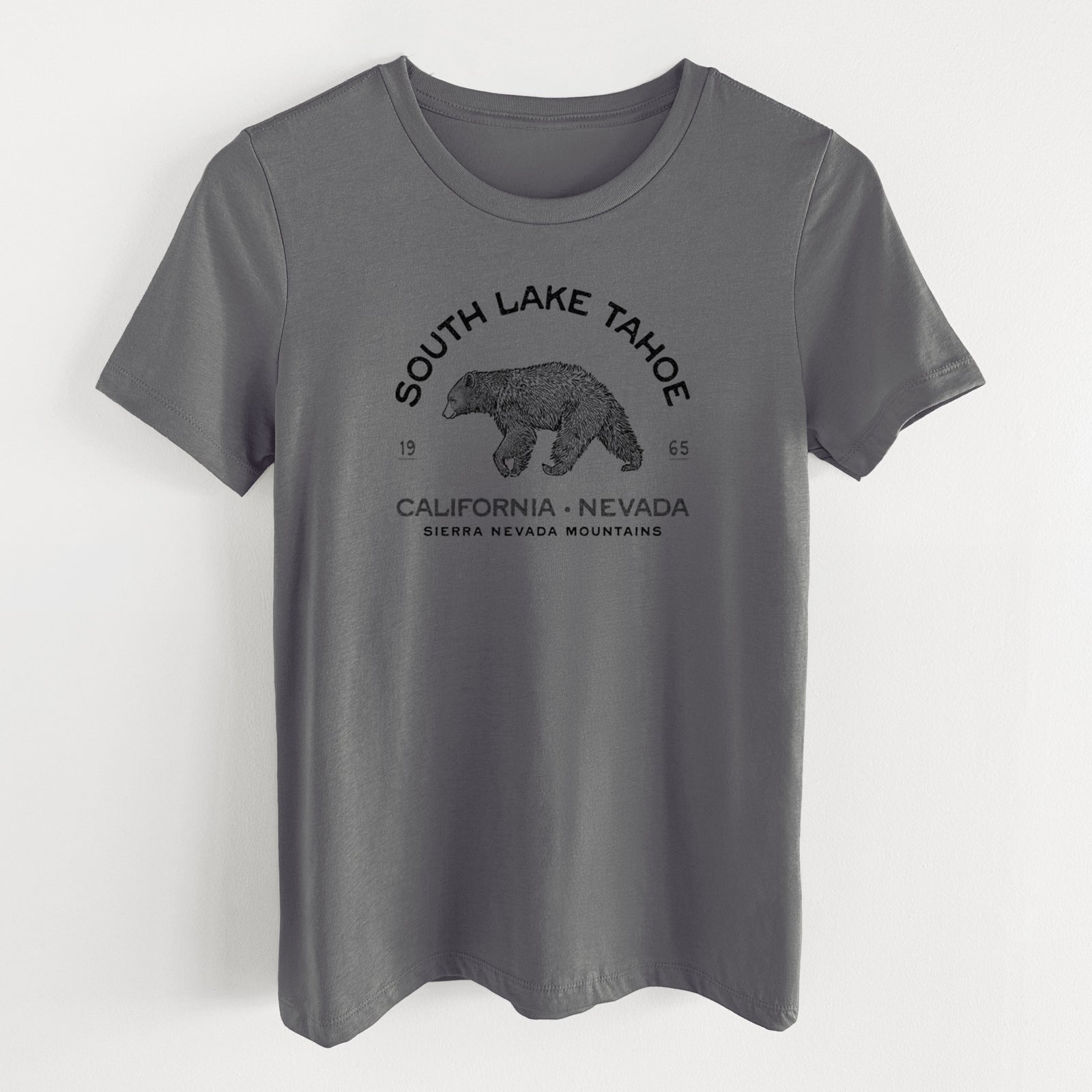 Asphalt women's relaxed fit cotton t-shirt laid flat, printed with a black ink bear with the words South Lake Tahoe, California - Nevada, Sierra Nevada Mountains.