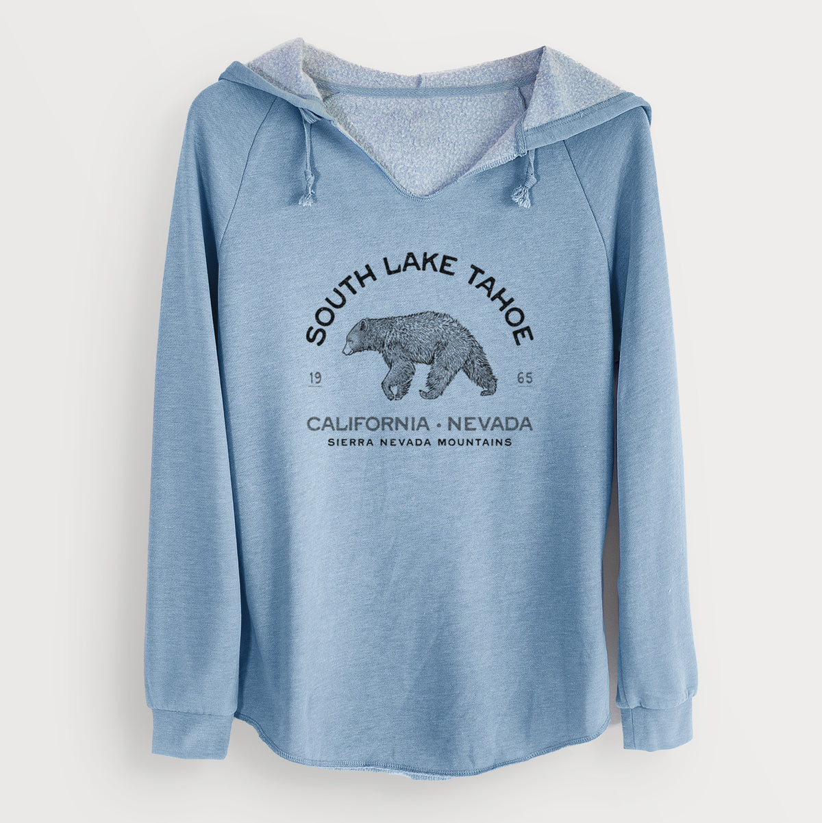 Misty blue women's Cali Wave hooded sweatshirt laid flat, printed with a black ink bear with the words South Lake Tahoe, California - Nevada, Sierra Nevada Mountains.