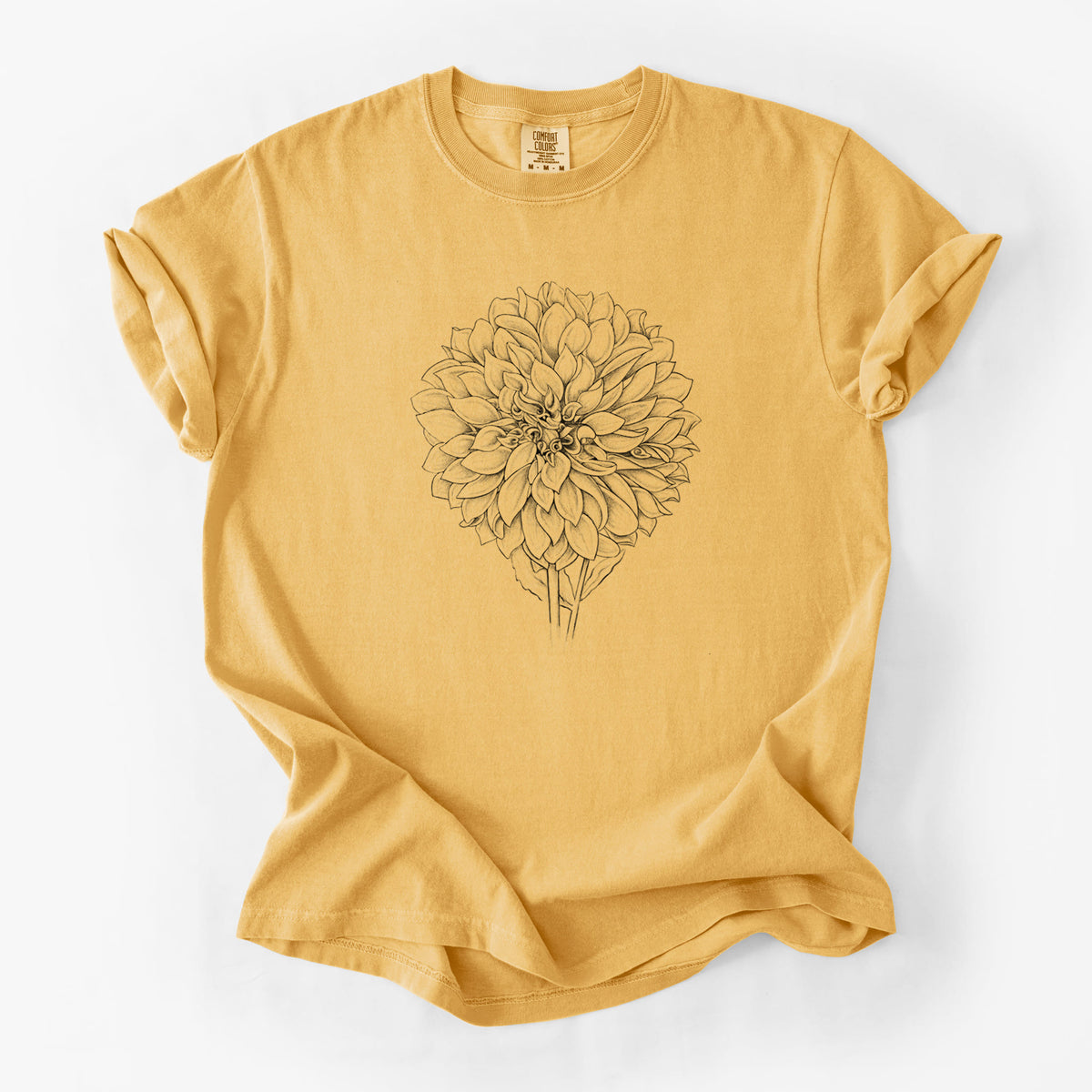 Golden wheat yellow Comfort Colors t-shirt laid flat, printed with a detailed black ink line drawing of a Cafe au Lait dahlia bloom.