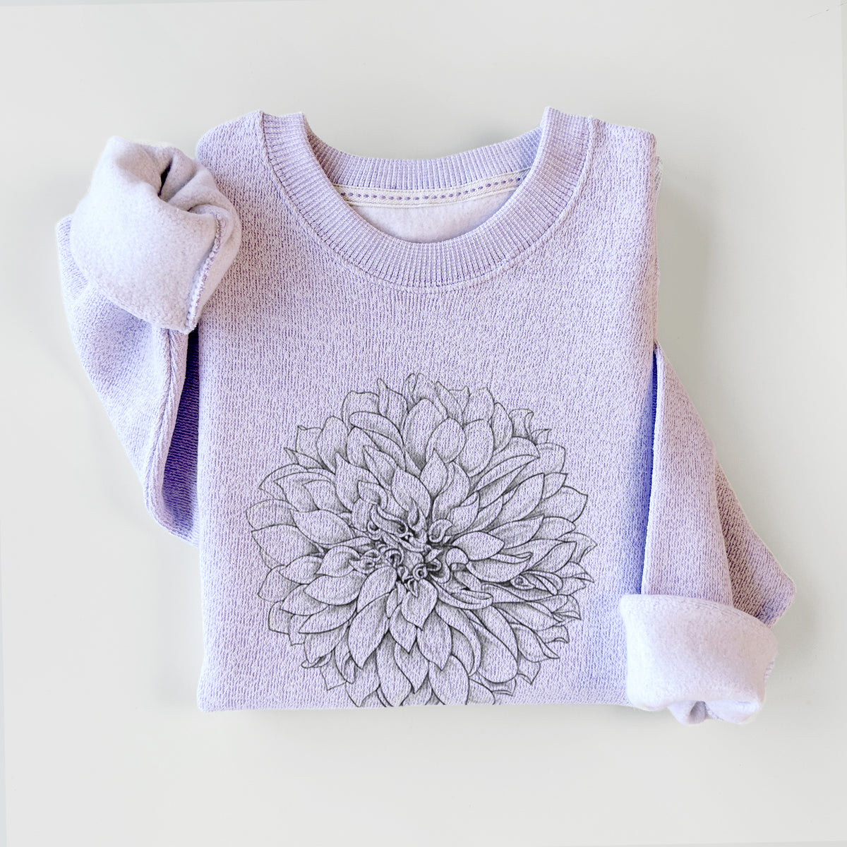 Ice purple knit sweatshirt printed with a detailed black ink line drawing of a Cafe au Lait dahlia bloom, styled flat.