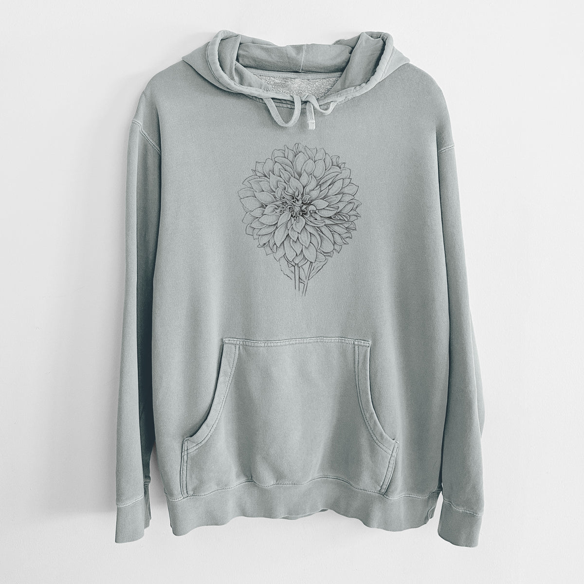 Sage green pigment dyed hoodie laid flat, printed with a detailed black ink line drawing of a Cafe au Lait dahlia bloom.