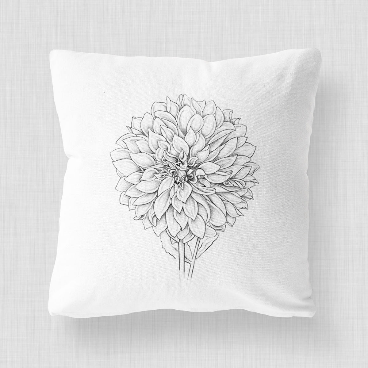 White pillow cover printed with a detailed black ink line drawing of a Cafe au Lait dahlia bloom.
