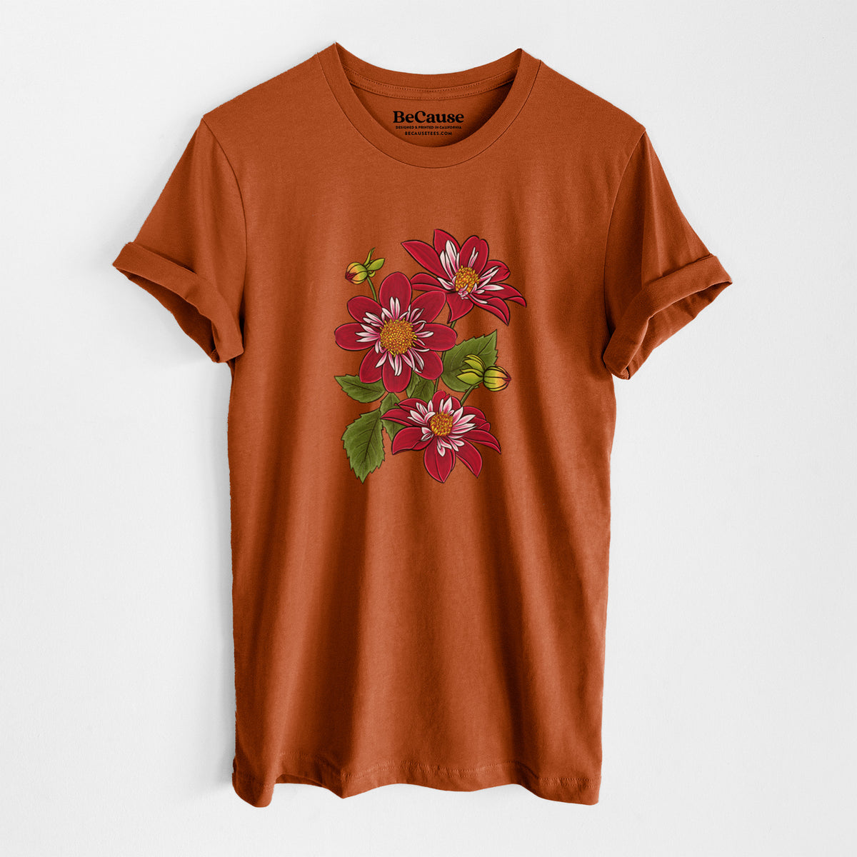 Autumn lightweight cotton t-shirt laid flat, printed with a full-color illustration of deep red dahlia flowers with green leaves and a small bee.