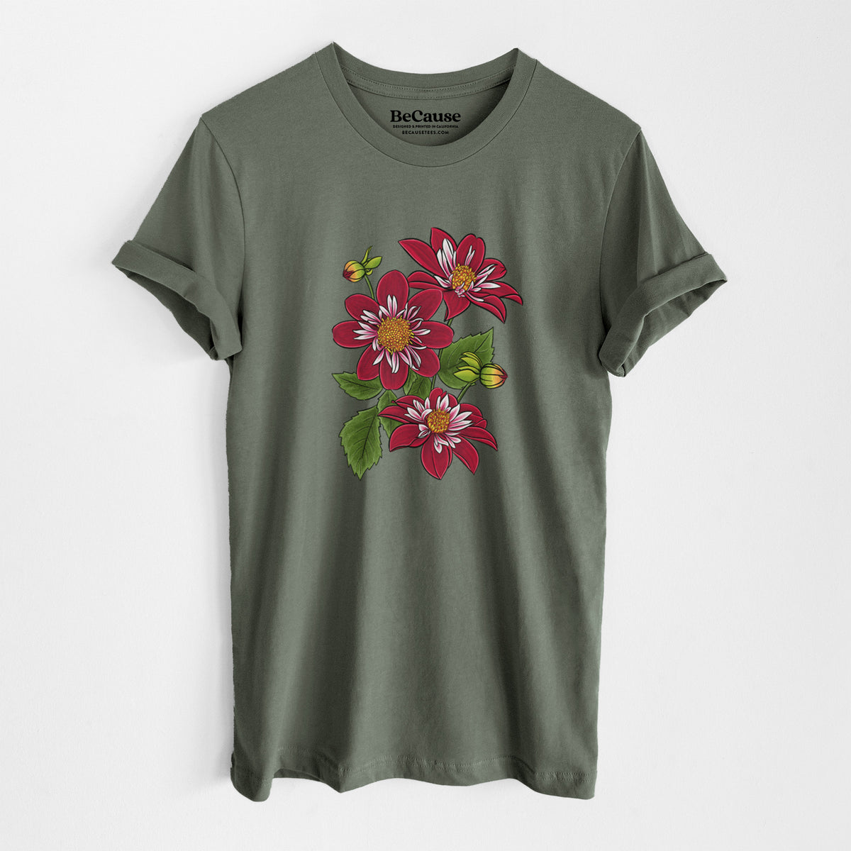 Military green lightweight cotton t-shirt laid flat, printed with a full-color illustration of deep red dahlia flowers with green leaves and a small bee.